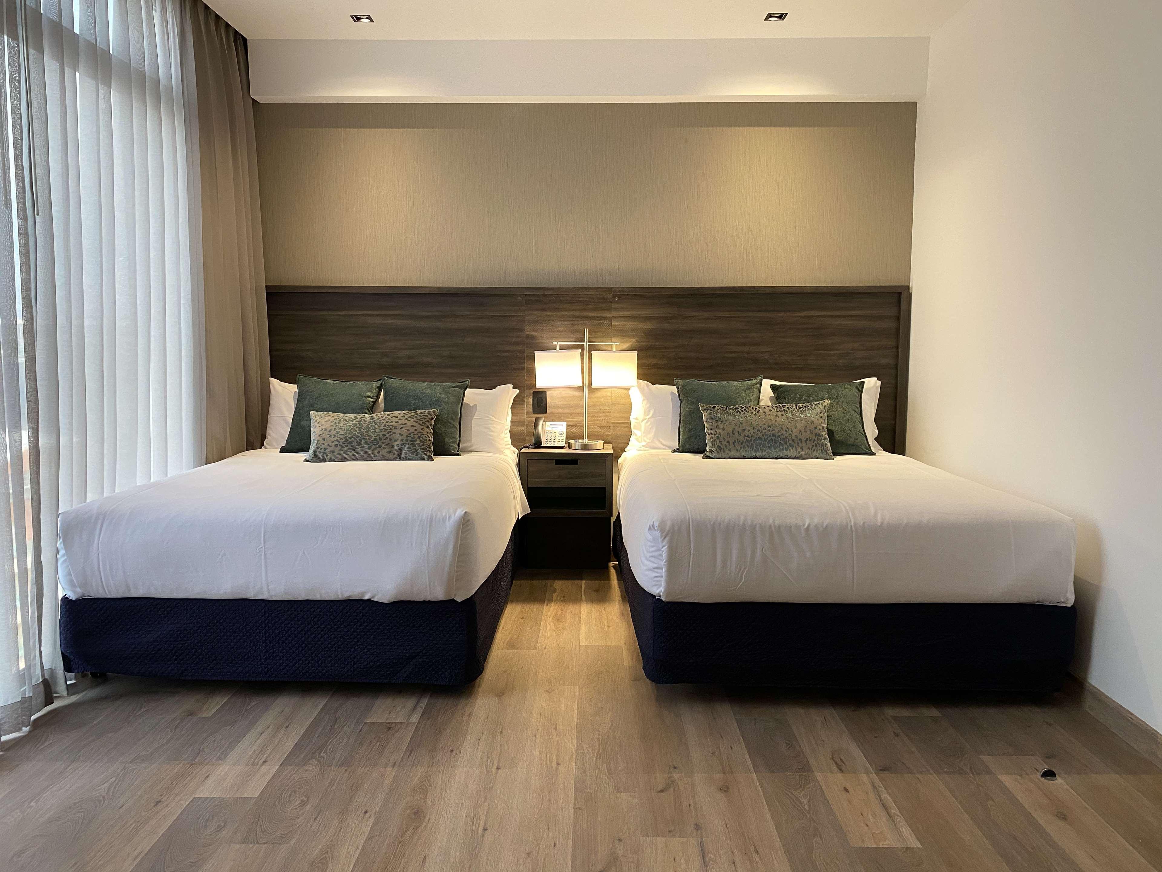 Wyndham Garden Guatemalaváros Kültér fotó A bedroom at the hotel