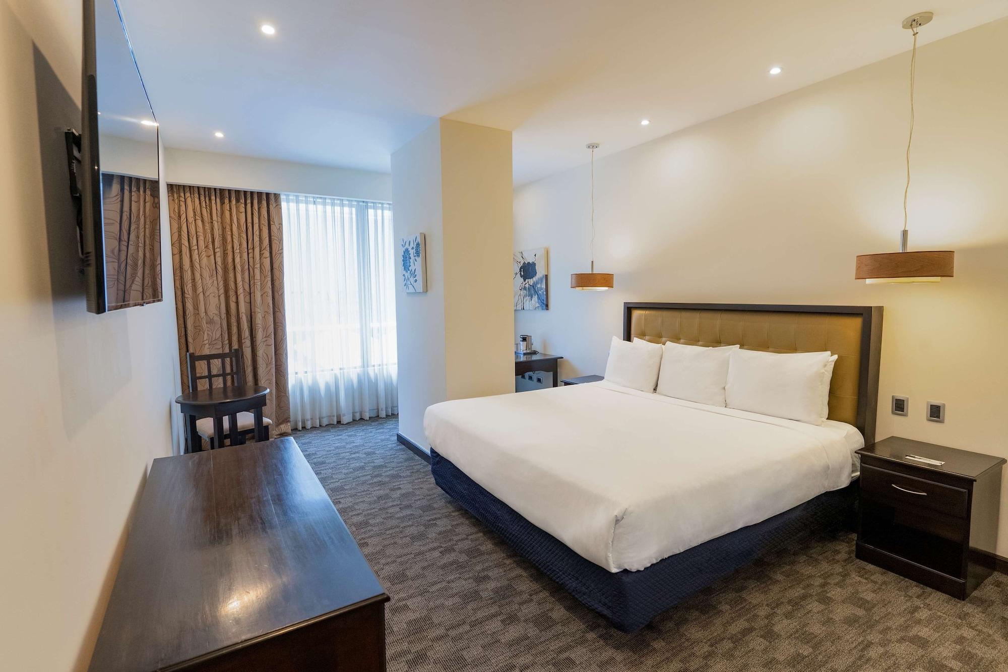 Wyndham Garden Guatemalaváros Kültér fotó A room at the hotel
